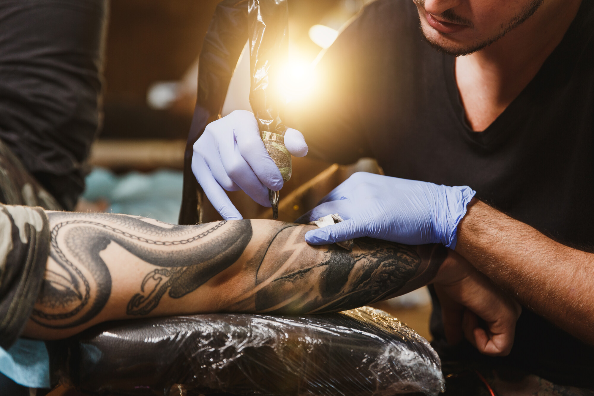 What Tattoo Artists Want People to Know, From Tips to Common Problems